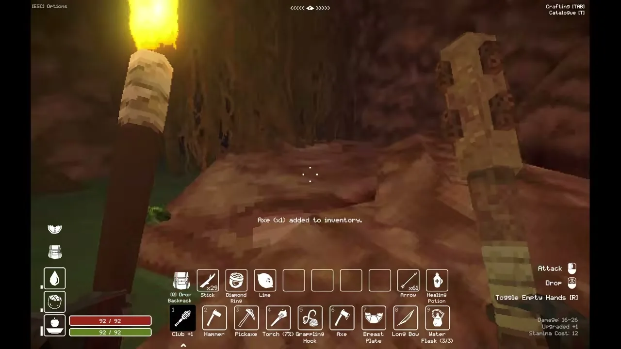 An Axe pickup notification and Axe icon inside a cave in Deep Dish Dungeon.