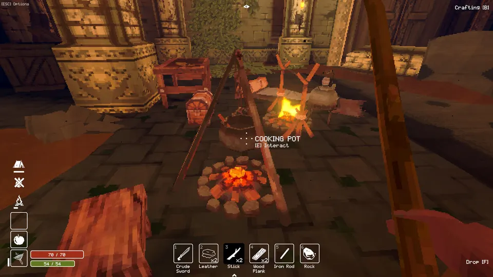 Leather, sticks and an iron rod in the item bar beside a camp in Deep Dish Dungeon.