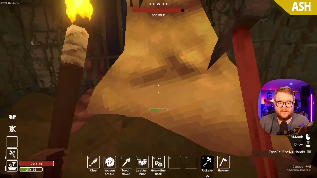 A player holds a Pickaxe in front of a labeled Goo Pile in Deep Dish Dungeon.